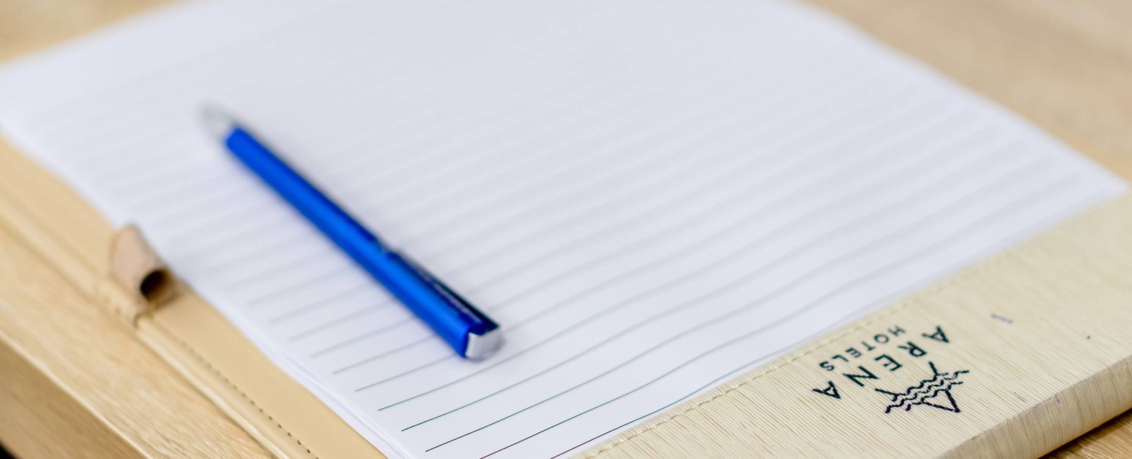 Notebook and pen ready for written study